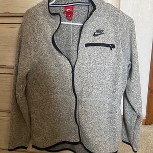 Nike women’s gray zip up. Size large.